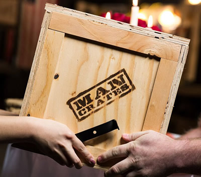 Man Crates Assisatnt shoppers